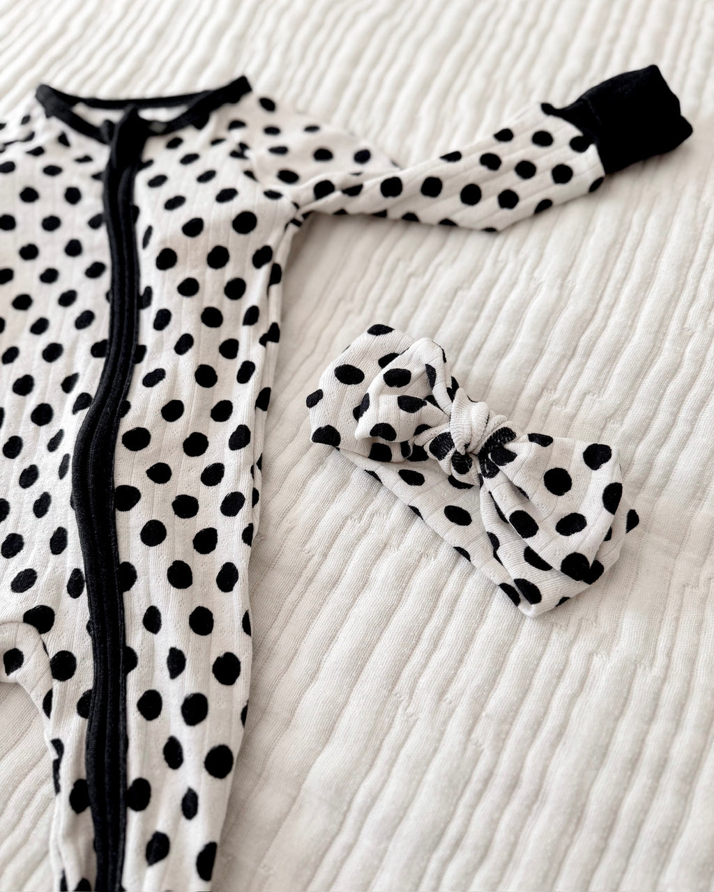 POLKA DOTS • baby pointelle zipper pajama (one-piece)