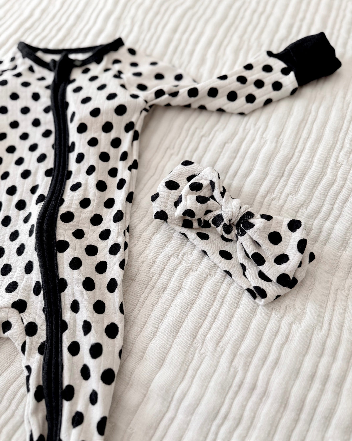 POLKA DOTS • baby pointelle zipper pajama (one-piece)