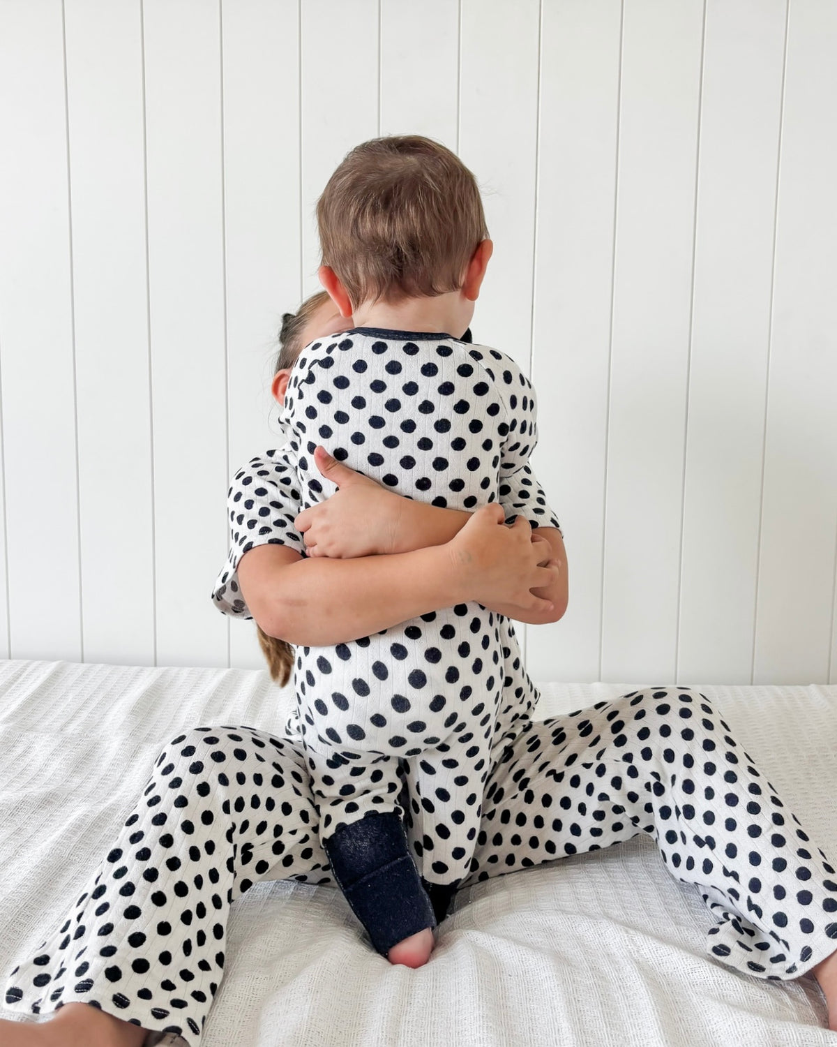 POLKA DOTS • baby pointelle zipper pajama (one-piece)