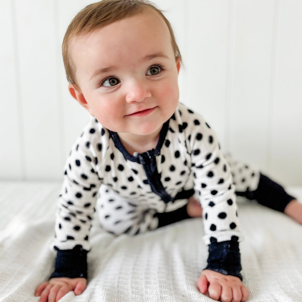 POLKA DOTS • baby pointelle zipper pajama (one-piece)